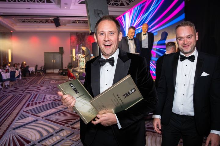 Walking off stage with the awards