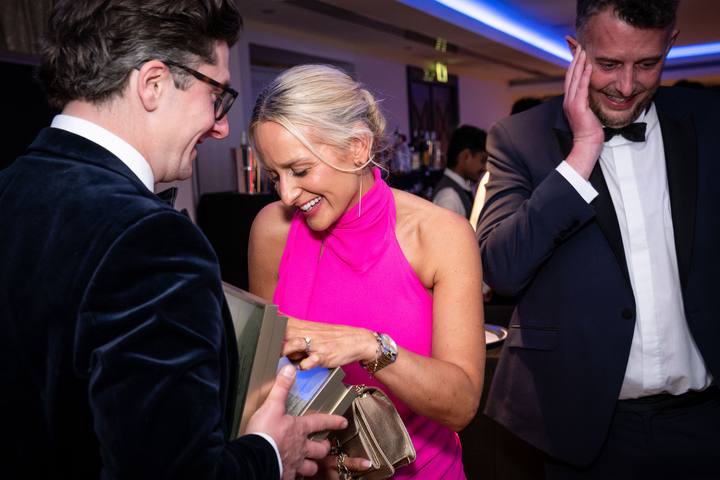 Liz Colley looking over the awards after the ceremony