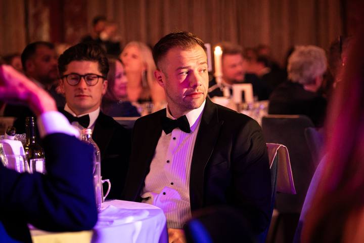 Watching the ceremony from the table