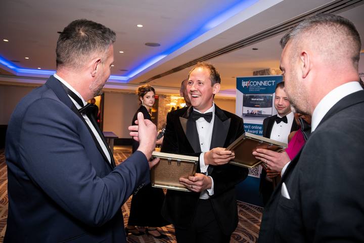 Talking with the presenters after collecting the awards