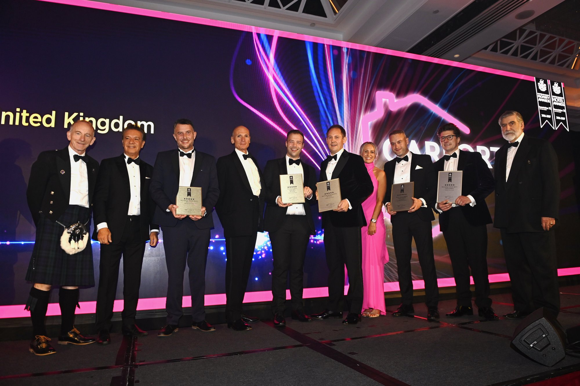 The Garforth Gray team on stage collecting their awards at the UK Property Awards